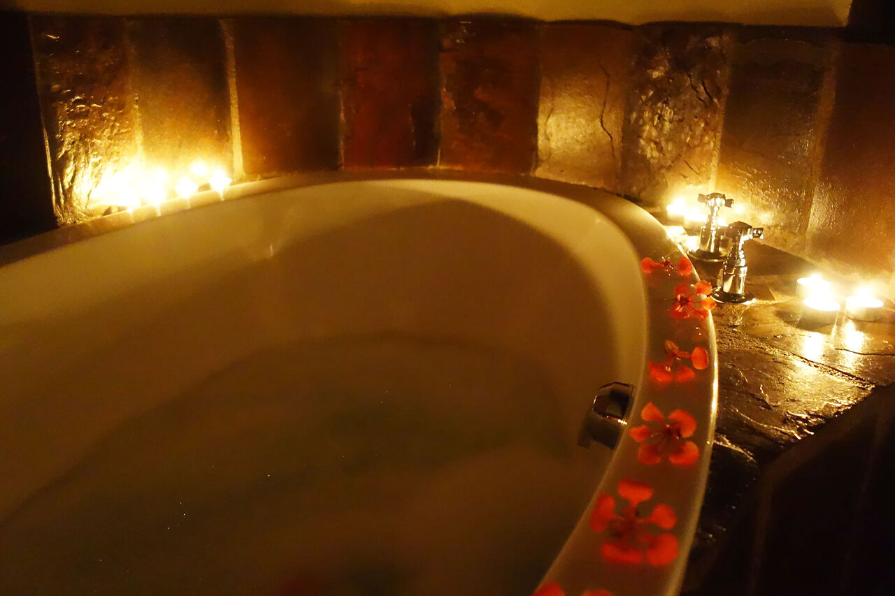3 bathtub with candles